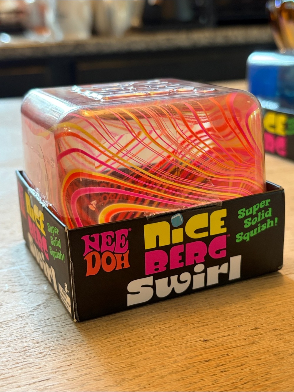 SCHYLLING | NeeDoh Nice Berg Swirl Squish Toy - Pink & Orange Swirl